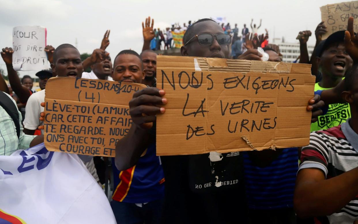 Supporters of Martin Fayulu, announced by the electoral commission as runner-up, have backed him in challenging the results at Congo's constitutional court - REUTERS