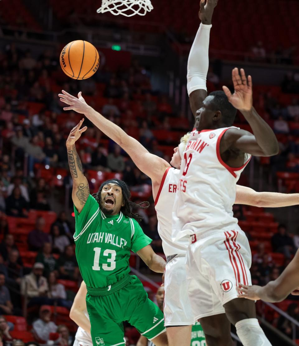 Utah Valley Wolverines guard Jaden McClanahan (13) goes to the hoop during the game against the Utah Utes at the Huntsman Center in Salt Lake City on Saturday, Dec. 16, 2023. | Spenser Heaps, Deseret News