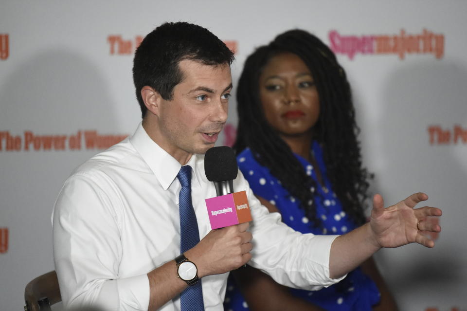 Democratic presidential candidate and South Bend, Indiana, Mayor Pete Buttigieg speaks Tuesday, Sept. 17, 2019, as organizer Alicia Garza, right, looks on during an event with Supermajority in Columbia, S.C. (AP Photo/Meg Kinnard)