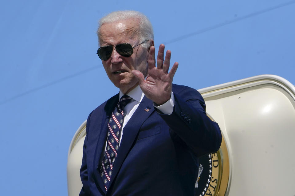 President Joe Biden waves before boarding Air Force One at Columbus International Airport in Columbus, Ohio, Friday, Sep. 9, 2022, after attending a groundbreaking for a new Intel computer chip facility in New Albany, Ohio. (AP Photo/Manuel Balce Ceneta)