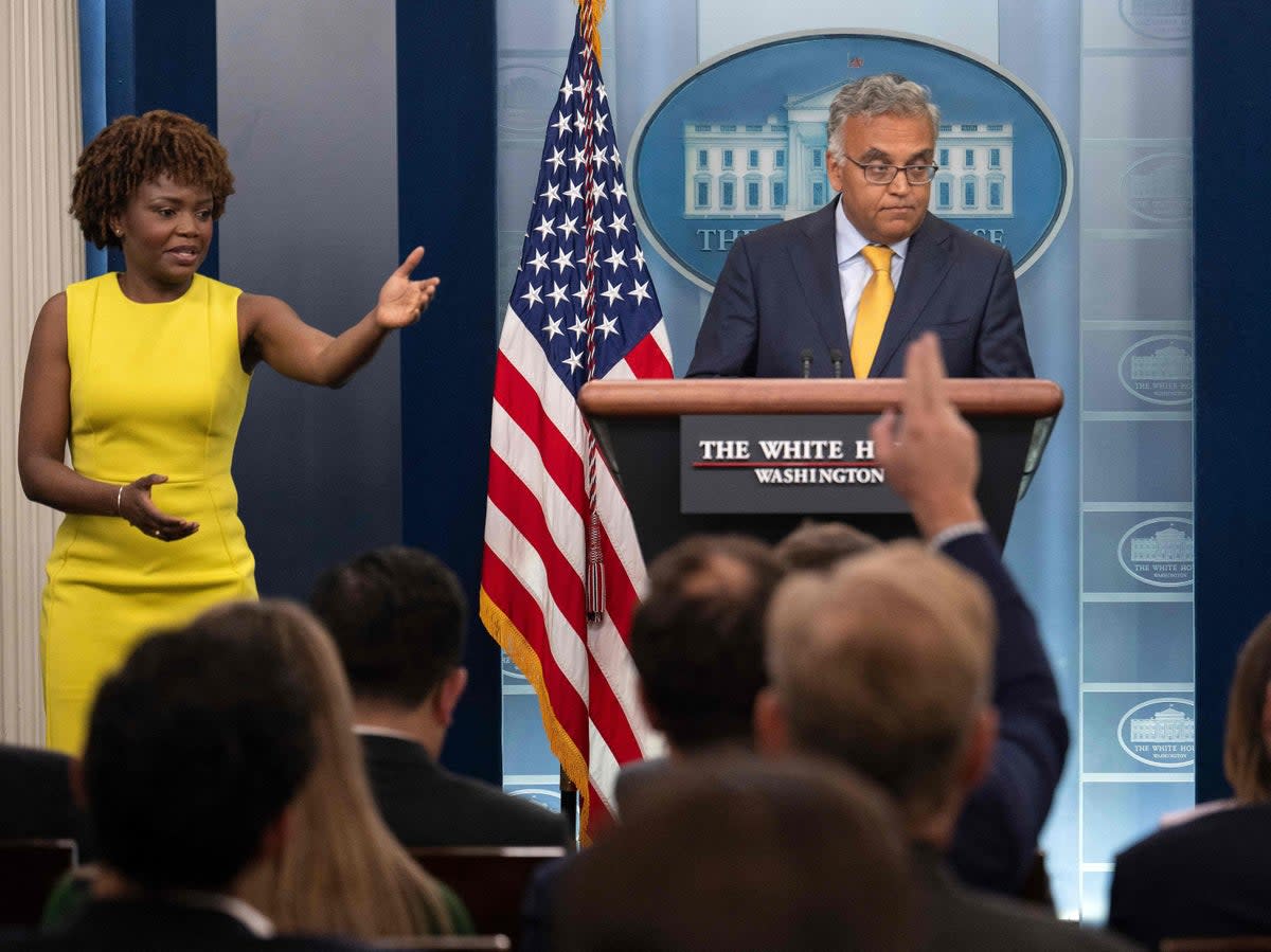 White House Covid-19 Response Coordinator Dr. Ashish Jha speaks flanked by White House Press Secretary Karine Jean-Pierre (L) during the Daily Press Briefing at the White House in Washington, DC, on June 2, 2022 (AFP via Getty Images)