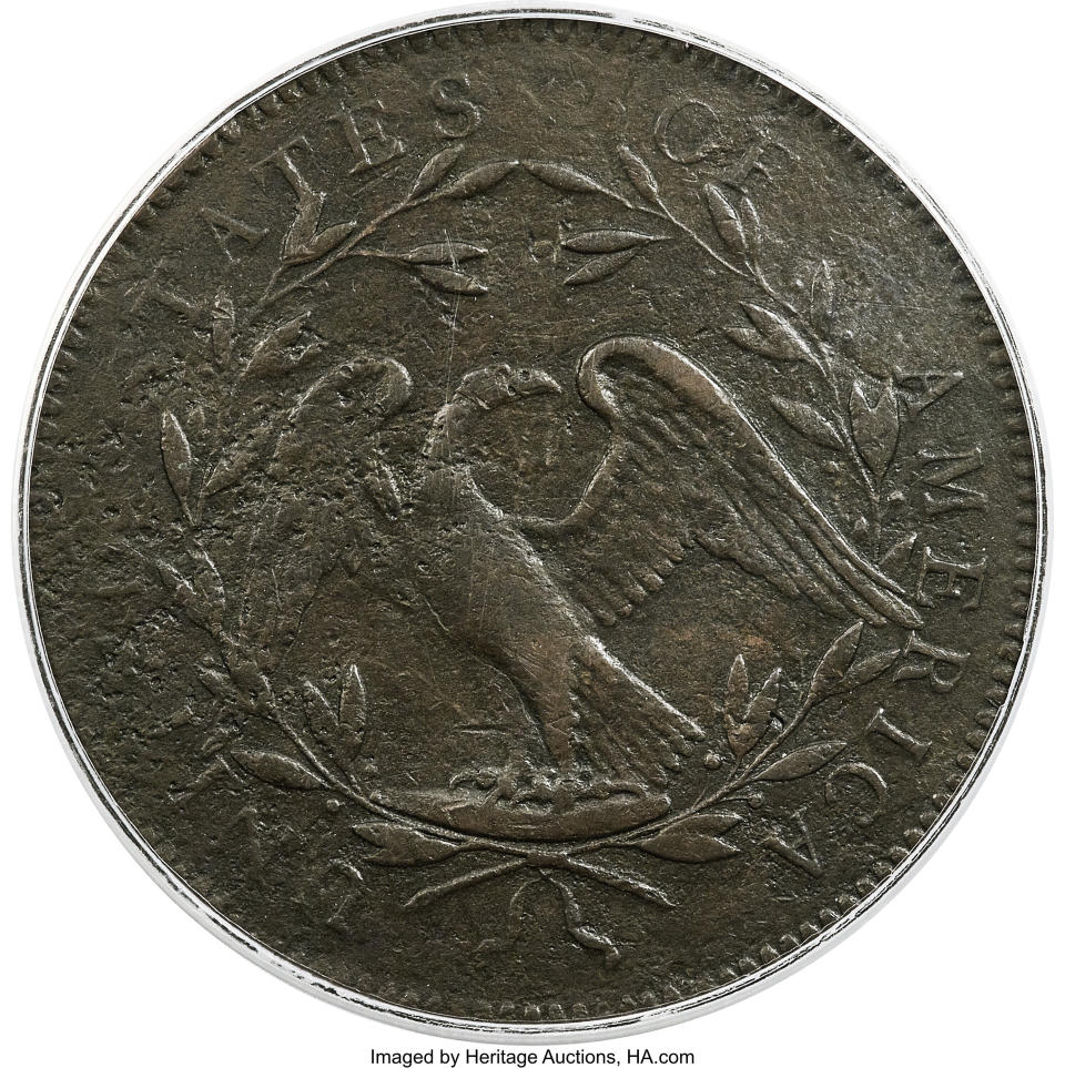 This undated photo provided by Heritage Auctions shows the back of a piece of copper that was struck by the U.S. Mint in Philadelphia in 1794 and was a prototype for the fledgling nation's money. The item, which is known as the “No Stars Flowing Hair Dollar," is owned by businessman and Texas Rangers co-chairman Bob Simpson and will go up for auction at Heritage Auctions in Dallas on Friday, April 23, 2021. (Emily Clements/Heritage Auctions via AP)