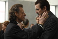 This image released by Sony Pictures Classics shows Mick Jagger, left, and Claes Bang in a scene from the film, "The Burnt Orange Heresy." Jagger plays a devilish art collector who cunningly convinces an art journalist, portrayed by Bang, to use a rare interview with a reclusive artist as an opportunity to steal one of his paintings. It’s Jagger’s first film since 2001’s “The Man From Elysian Fields.” (Jose Haro/Sony Pictures Classics via AP)