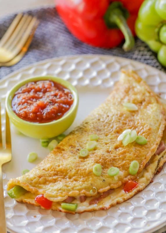 <p>Li'l Luna</p><p>Packed with cheese, bell peppers, and ham, it is so delicious and fluffy.</p><p><strong>Get the recipe: <a href="https://lilluna.com/western-omelette/" rel="nofollow noopener" target="_blank" data-ylk="slk:Western Omelette;elm:context_link;itc:0;sec:content-canvas" class="link ">Western Omelette</a></strong></p>