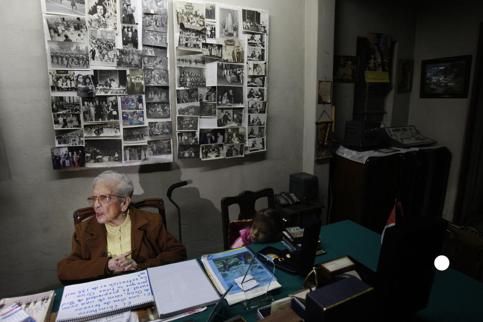 In this Nov. 26, 2012 photo, journalist and radio host Maria Julia Venegas , better known as Maruja Venegas, 97, speaks during an interview at her home in Lima, Peru. Venegas who began broadcasting “Radio Club Infantil,” a show for Peru's children in the golden age of radio and World War II, has earned a citation from Guinness World Records as the globe's longest-running radio personality. (AP Photo/Karel Navarro)