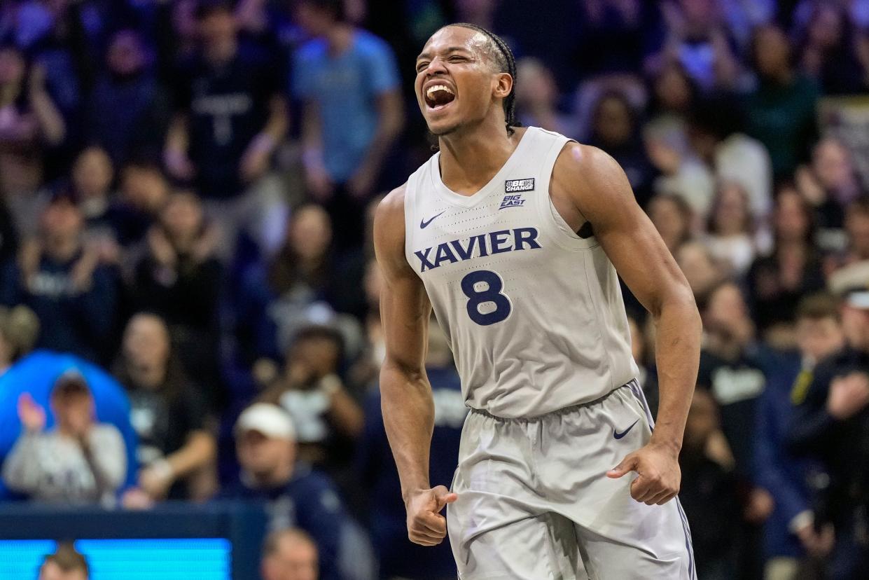 Xavier guard Quincy Olivari celebrates after scoring 32 points in a win over DePaul at Cintas Center on Wednesday, Feb. 28, 2024.