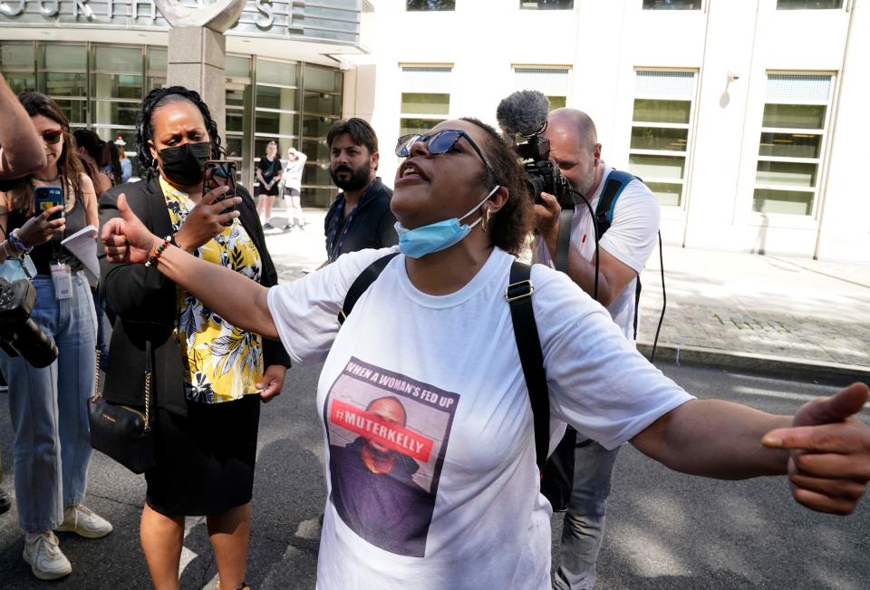 R&B singer R. Kelly's supporter reacts following the sentencing hearing at Brooklyn Federal Court in New York, on June 29, 2022. (AFP via Getty Images)