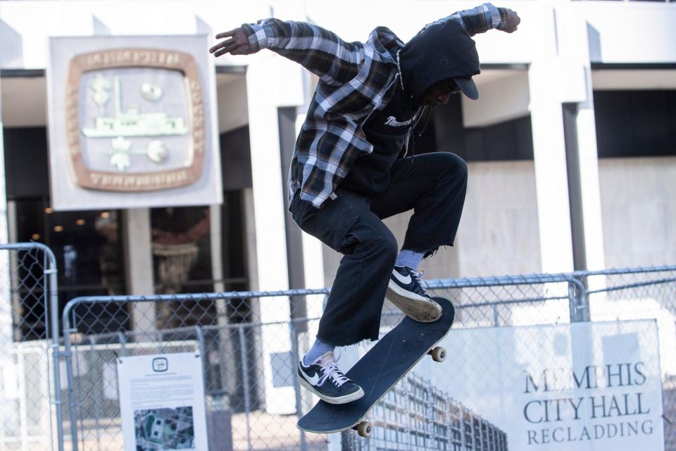 Kameron Blakely performs a trick in front of Memphis City Hall while Tyre Nichols’ family reviews footage of his death inside in Memphis, Tenn., on Monday, January 23, 2023. Nichols was a skater and because of this members of the Memphis skateboarding community came out to support his family. “Just solidarity and showing love and support for Tyre,” Blakely said to why he came to city hall today. “Tyre was a light that got turned off way too soon. Especially in the skateboarding community, everybody knows everybody.”