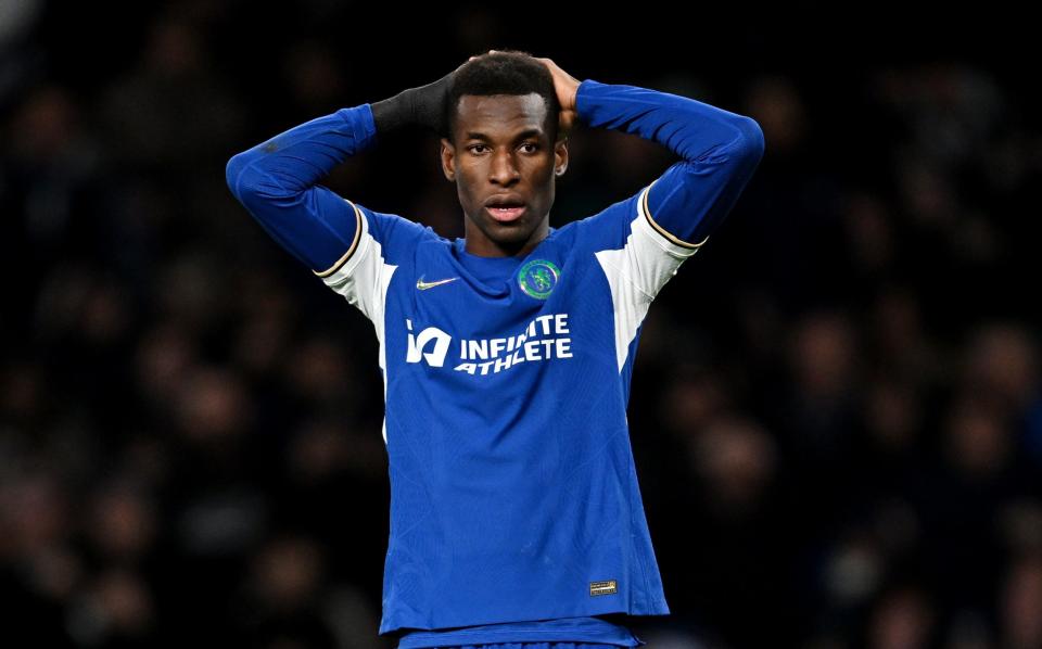 Chelsea's Nicolas Jackson with his hands on his head during the League Cup quarter-final against Newcastle