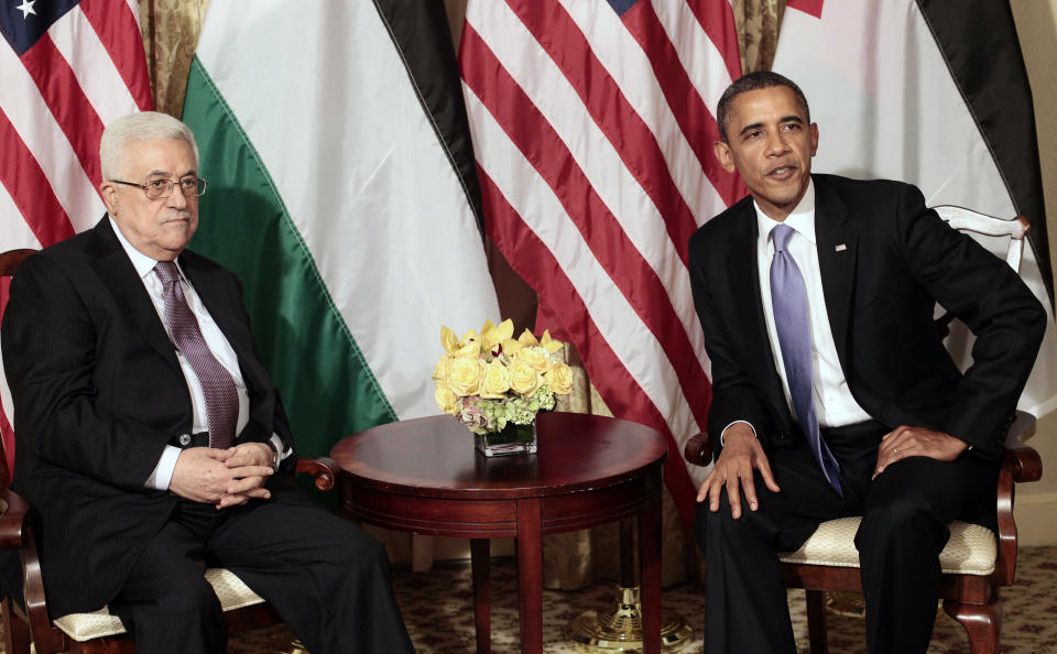 File - In this Sept. 21, 2011 file photo, President Barack Obama and Palestinian President Mahmoud Abbas are seen during a meeting in New York. Abbas only faces bad options, from his perspective, as he heads into a White House meeting Monday with Obama. He could accept a U.S.-proposed framework for an Israeli-Palestinian partition deal, he could reject it or he could agree to extend negotiations. Here's a look at what's ahead. (AP Photo/Pablo Martinez Monsivais, File)