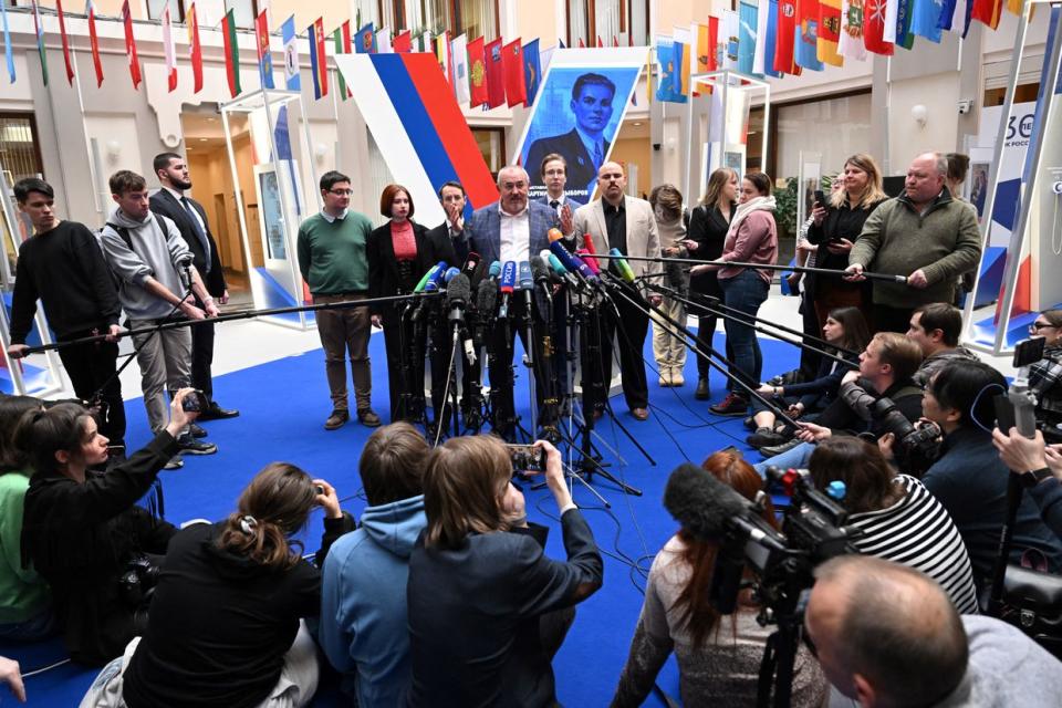Boris Nadezhdin (C), the Civic Initiative Party presidential hopeful, speaks to journalists following a meeting at the Central Election Commission in Moscow on February 8, 2024. Russia's election commission on February 8, 2024 blocked pro-peace politician Boris Nadezhdin from running in next month's presidential election, the candidate said in a post on social media. (Natalia Kolesnikova/AFP via Getty Images)