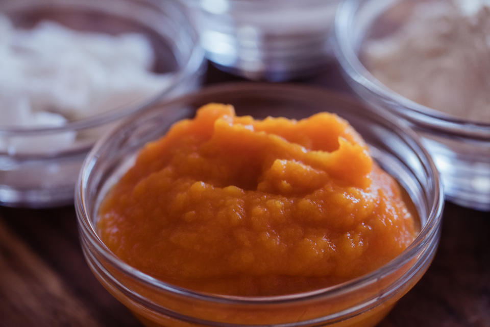Pumpkin purée and other ingredients in small bowls.