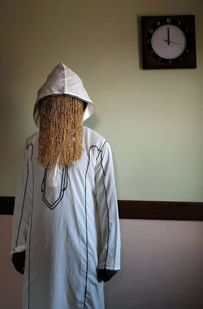 Undercover journalist Anas Aremeyaw Anas poses during an interview with Reuters in Accra, Ghana June 11, 2018. REUTERS/Francis Kokoroko