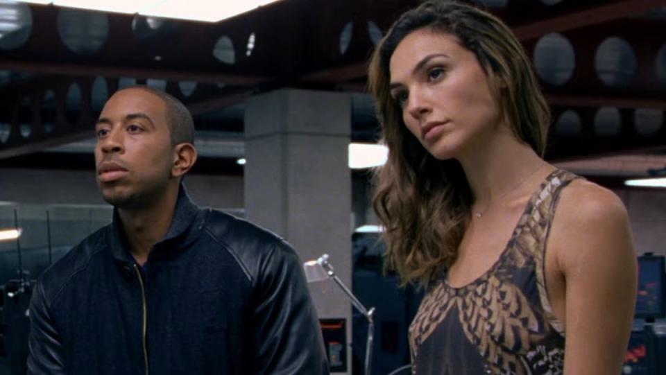 Tej and Gisele listen to Dom speak in Fast & Furious 6