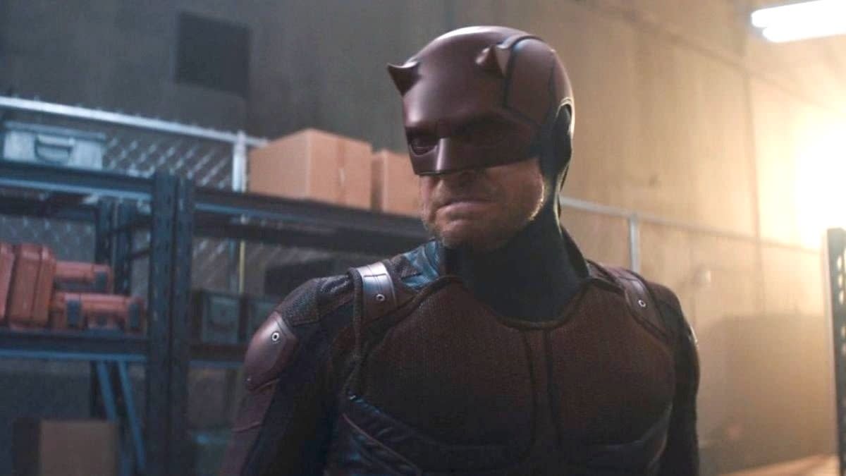  Dardevil grimaces in a warehouse as he looks at an off-camera Maya Lopez in Marvel's Echo TV show. 