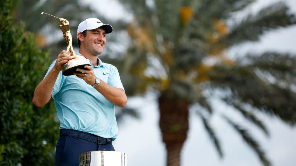 Scheffler hoists the trophy in 2023. - Jared C. Tilton/Getty Images