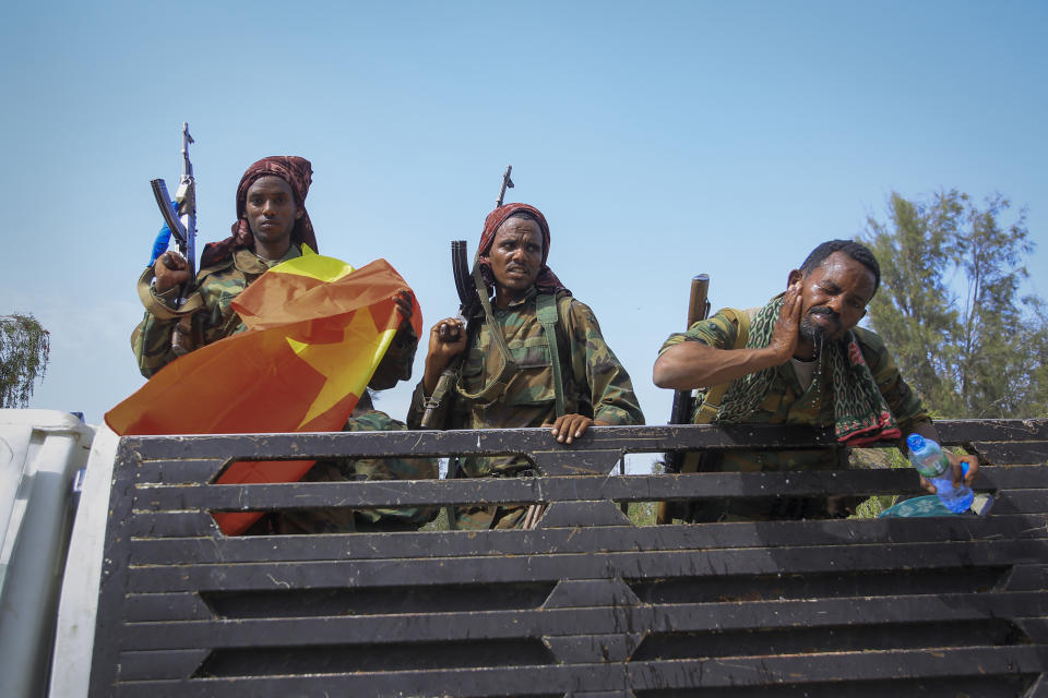 FILE - In this Tuesday, June 29, 2021 file photo, Tigray forces ride in a truck after taking control of Mekele, in the Tigray region of northern Ethiopia. The leader of the Oromo Liberation Army armed group that Ethiopia's government has designated a terrorist organization says his group has struck a military alliance with the Tigray forces, in an interview on Wednesday, Aug. 11, 2021. (AP Photo, File)