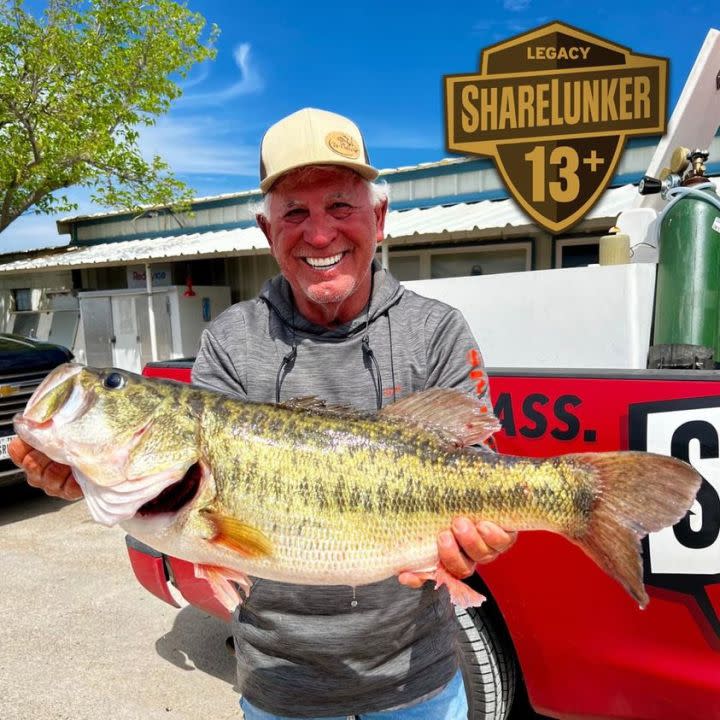 Larry Walker showing off his 13.62-pound Legacy ShareLunker