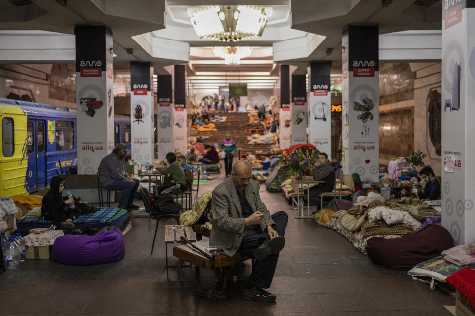 Residents stay in the city subway of Kharkiv, in eastern Ukraine, on Thursday, May 19, 2022. Although the bombings in Kharkiv have decreased and the subway is expected to run beginning of next week, still some residents use it as a temporary bomb shelter. (AP Photo/Bernat Armangue)