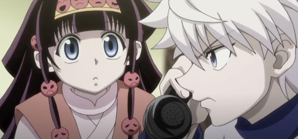 Alluka blankly stares at brother while he's on the phone