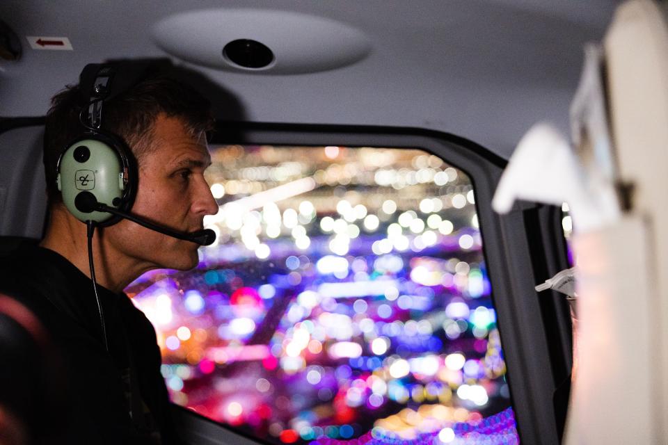 Ryan “Kaskade” Raddon, looks out the window during a helicopter ride to the EDC music festival at the Las Vegas Motorway in Las Vegas on Saturday, May 20, 2023. | Ryan Sun, Deseret News