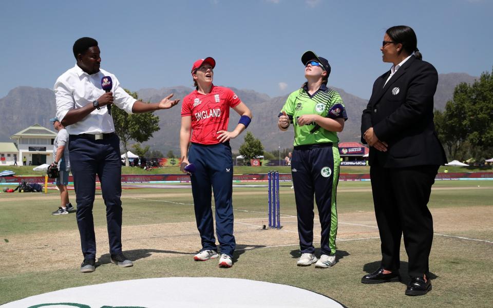 Laura Delany of Ireland flips the coin as Heather Knight of England looks on ahead of the ICC Women's T20 World Cup group B match between Ireland and England at Boland Park on February 13, 2023 in Paarl, South Africa. - Jan Kruger-ICC/ICC via Getty Images