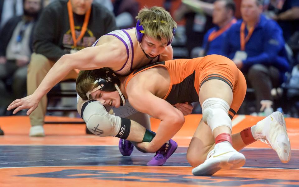 Washington's Kannon Webster takes down Civic Memorial's Bryce Griffin in the 145-pound title match of the  Class 2A state wrestling tournament Saturday, Feb. 18, 2023 at State Farm Arena in Champaign. Webster repeated as state champ with an 18-8 major decision.