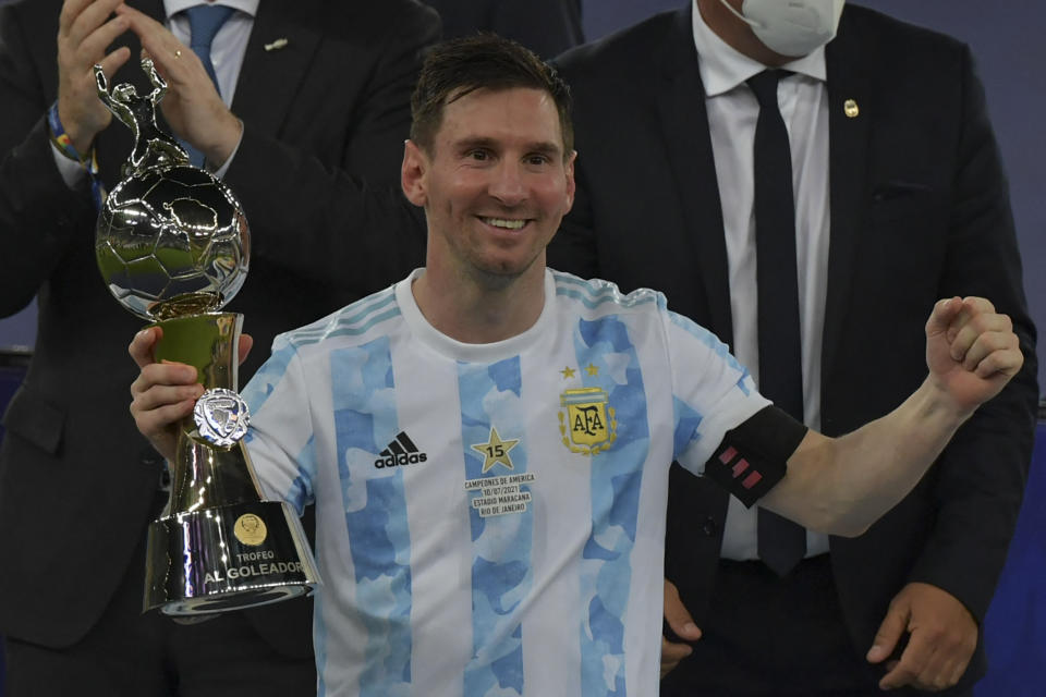 Argentina's Lionel Messi holds the trophy for the championship's Top Scorer after winning the Conmebol 2021 Copa America football tournament final match against Brazil at Maracana Stadium in Rio de Janeiro, Brazil, on July 10, 2021. (Photo by NELSON ALMEIDA / AFP) (Photo by NELSON ALMEIDA/AFP via Getty Images)