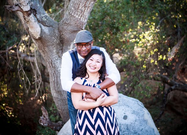 The author and her then-fiance Sean posing for an engagement photo in February 2015. (Photo: Courtesy of Sun Yen Cumby)