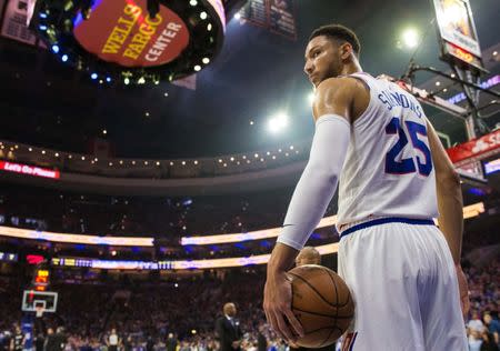 FILE PHOTO: May 5, 2019; Philadelphia, PA, USA; Philadelphia 76ers guard Ben Simmons (25) holds the ball during a timeout in the first quarter in game four of the second round of the 2019 NBA Playoffs against the Toronto Raptors at Wells Fargo Center. Mandatory Credit: Bill Streicher-USA TODAY Sports