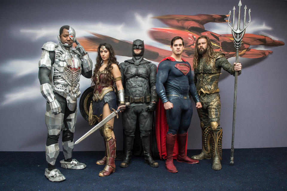 LONDON, ENGLAND - NOVEMBER 15:  The character Cyborg, Wonder Woman, Batman, Superman and Aquaman from the Justice League film pose in character infront of film based promotional artwork unveiled for the first time during a photocall at The Leicester Square Odeon Cinema before the UK premiere on November 15, 2017 in London, England.  (Photo by Ollie Millington/Getty Images)