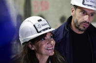 Paris' mayor Anne Hidalgo, left, and President of the Paris 2024 Olympics and Paralympics Organizing Committee Tony Estanguet the Austerlitz inaugurate the wastewater and rainwater storage basin, which is intended to make the Seine river swimmable during the Paris 2024 Olympic Games, in Paris, Thursday, May 2, 2024. The works underground next to Paris' Austerlitz train station are part of a 1.5 billion euro effort to clean up the Seine so it can host marathon swimming and triathlon events at the July 26-Aug 11 Summer Games and be opened to the general public for swimming from 2025. (Stephane de Sakutin, Pool via AP)