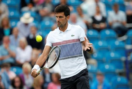 Tennis - WTA Premier - Aegon International - Devonshire Park Lawn Tennis Club, Eastbourne, Britain - June 27, 2017 Serbia's Novak Djokovic in action during his second round match against Canada's Vasek Pospisil Action Images via Reuters/Matthew Childs