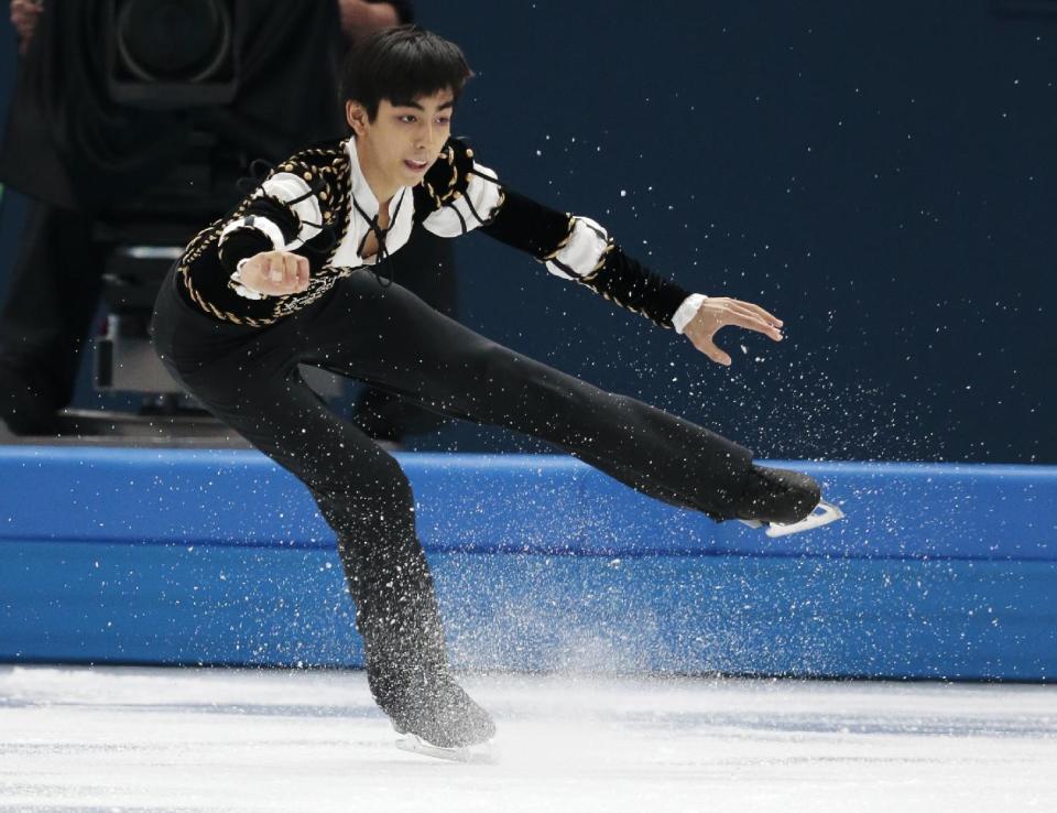 Michael Christian Martinez of the Philippines competes in the men's short program figure skating competition at the Iceberg Skating Palace during the 2014 Winter Olympics, Thursday, Feb. 13, 2014, in Sochi, Russia. (AP Photo/Ivan Sekretarev)