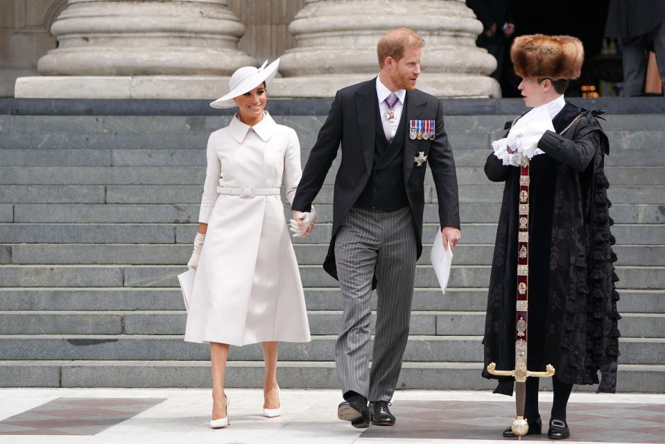 Prince Harry and Meghan, Duchess of Sussex leaves after attending a service of thanksgiving for the reign of Queen Elizabeth II at St Paul’s Cathedral in London, Friday June 3, 2022 on the second of four days of celebrations to mark the Platinum Jubilee. The events over a long holiday weekend in the U.K. are meant to celebrate the monarch’s 70 years of service. (Kirsty O'Connor, Pool Photo via AP)