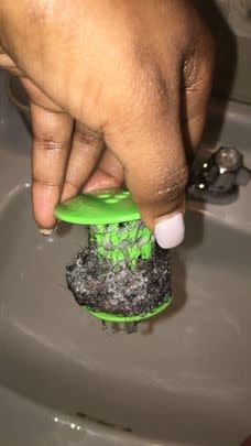 A TubShroom that catches all types of hair and product residue to prevent your drains from getting clogged