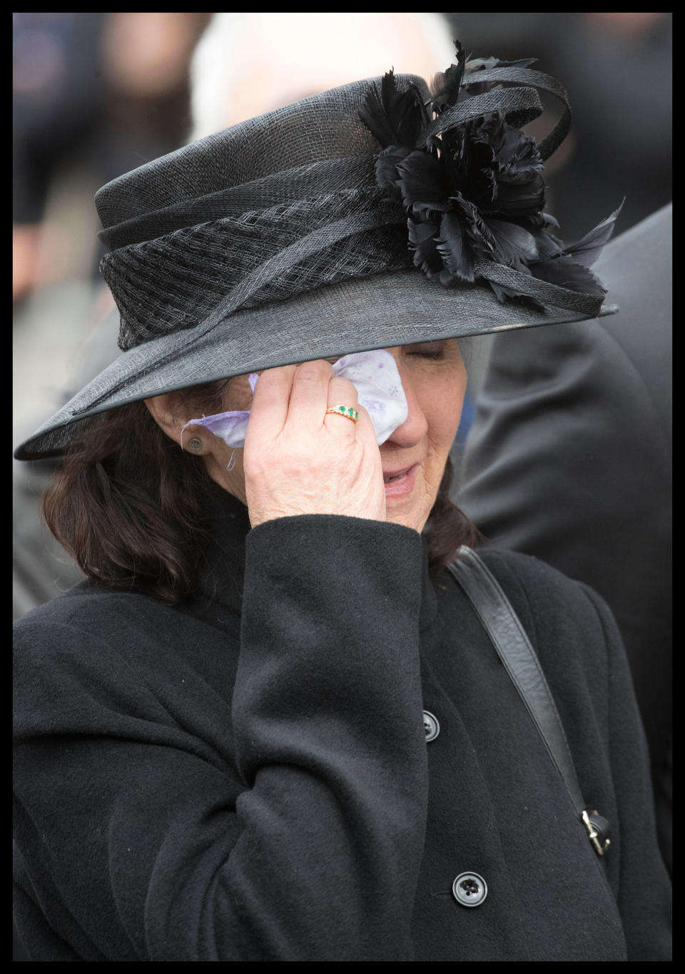 <p>Professor Stephen Hawking’s first wife Jane breaks down in tears as his coffin leaves the University Church of St Mary the Great at the end of his funeral service in Cambridge, England on March 31, 2018. (Photo: Andrew Parsons/i-Images via ZUMA Press) </p>