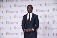 Actor David Oyelowo poses for photographers upon arrival at the Bafta Film Awards, in central London, Sunday, April 11 2021. (AP Photo/Alberto Pezzali)