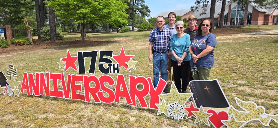 St. Andrews United Methodist Church off Ramsey Street will celebrate its 175th anniversary on Sunday. Pictured are Phillip Gilmore, left, Lead Pastor Scott Foster, Janet Adams, Associate Pastor Steve Brotherton and Nicole Edson, head of children's ministry.