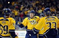 Dec 21, 2015; Nashville, TN, USA; Nashville Predators defenseman Shea Weber (6) celebrates with teammates after scoring during the first period against the Montreal Canadiens at Bridgestone Arena. Mandatory Credit: Christopher Hanewinckel-USA TODAY Sports / Reuters Picture Supplied by Action Images