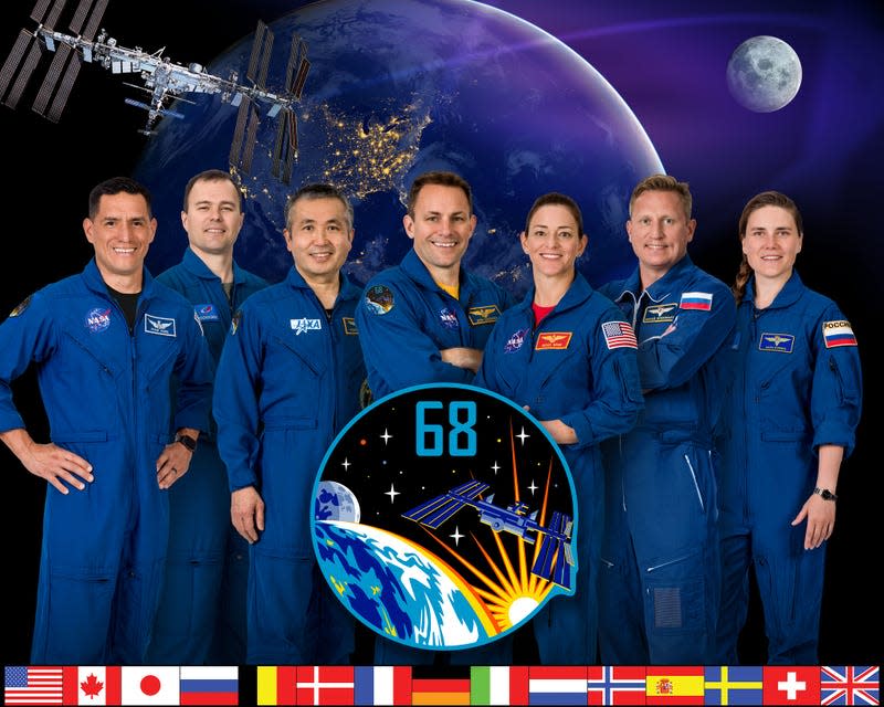 The Expedition 68 crew. From left are, NASA astronaut Frank Rubio; Roscosmos cosmonaut Dmitri Petelin; Japan Aerospace Exploration Agency (JAXA) astronaut Koichi Wakata; NASA astronauts Josh Cassada and Nicole Mann; and Roscosmos cosmonauts Sergey Prokopyev and Anna Kikina.