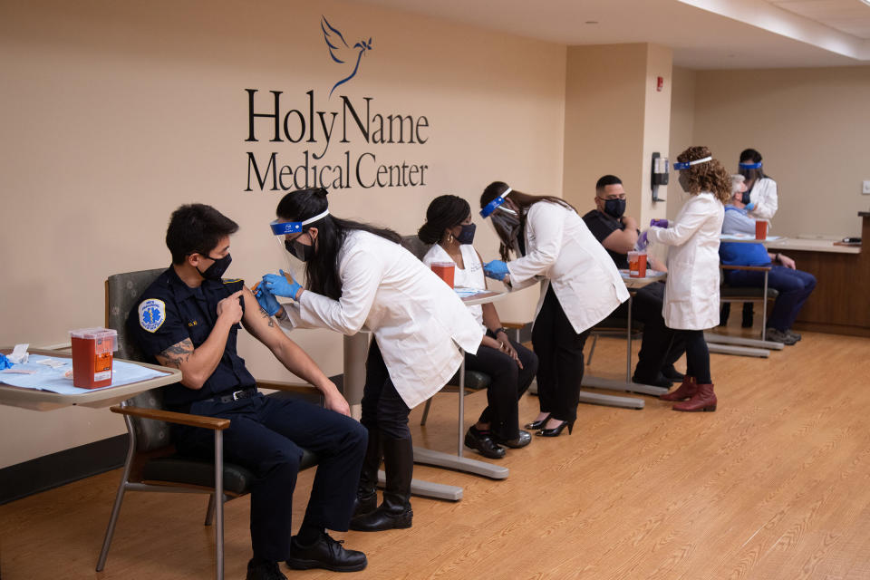 Vaccines were given to 10 Holy Name employees Thursday. Many have seen the worst of the pandemic. (John O'Boyle/Holy Name Medical Center)