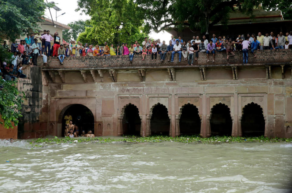 <p>Indians look at the flooded river Ganges from the top of a Hindu temple in Allahabad, India, Wednesday, Aug. 24, 2016. (AP Photo/Rajesh Kumar Singh)</p>