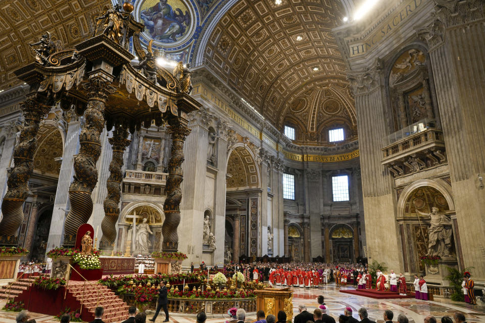 FILE - Pope Francis presides over a mass on St. Peter and Paul's Day in St. Peter's Basilica at The Vatican, Thursday, June 29, 2023. Vatican officials unveiled plans, Thursday, Jan. 11, 2024, for a year-long, 700,000 euro restoration of the 17th century, 95ft-tall bronze canopy by Giovan Lorenzo Bernini surmounting the papal Altar of the Confession of the Basilica, pledging to complete the first comprehensive work on this masterpiece in 250 years before Pope Francis' big 2025 Jubilee. (AP Photo/Andrew Medichini, File)