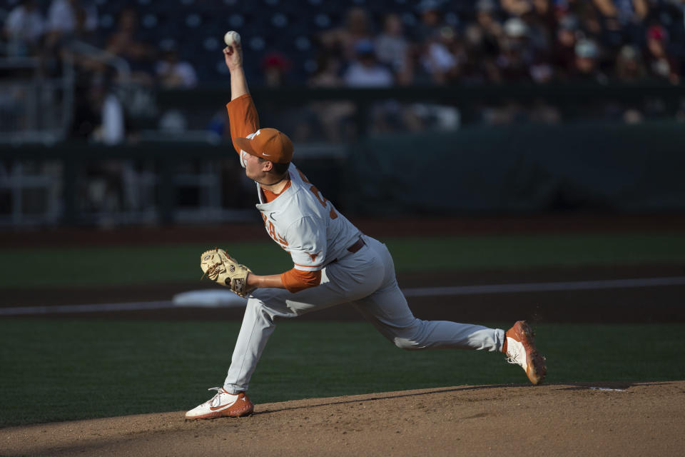 Texas's Ty Madden (32) throws a pitch against Mississippi State in the second inning of an NCAA college baseball game in the College World Series Thursday, June 24, 2021, at TD Ameritrade Park in Omaha, Neb. (AP Photo/John Peterson)