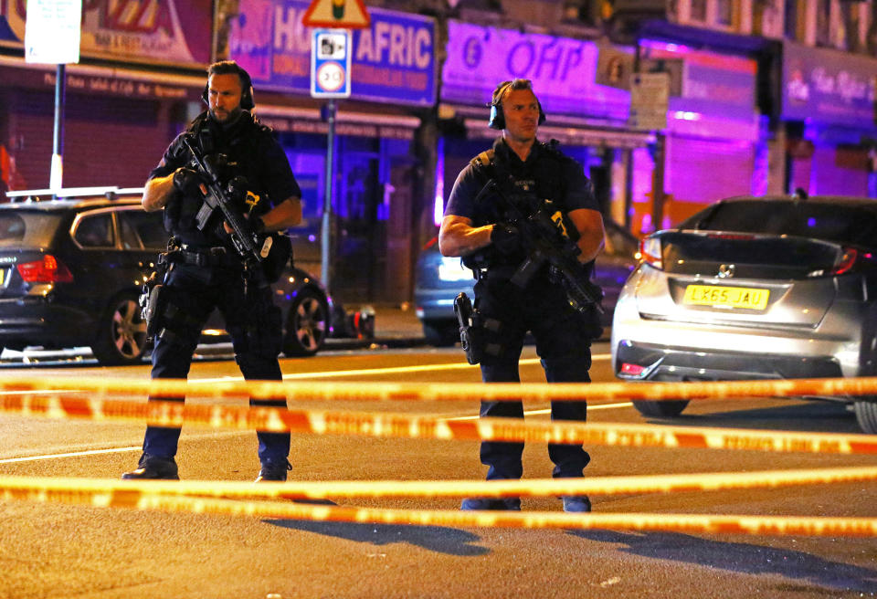 <p>Armed police officers attend to the scene after a vehicle collided with pedestrians in the Finsbury Park neighborhood of North London, Britain June 19, 2017. (Neil Hall/Reuters) </p>