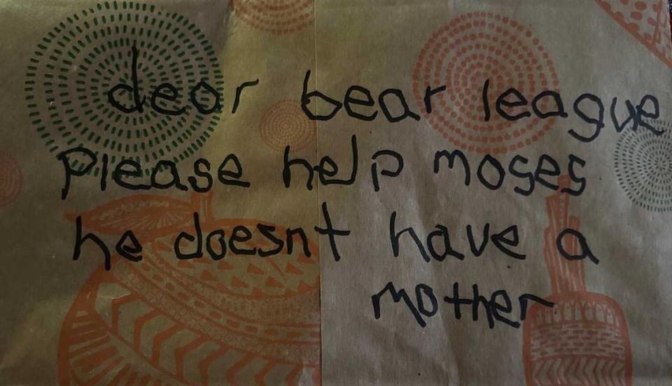 A note left with an apparently orphaned bear reads “Please help moses he doesn’t have a mother.” The bear cub was left Saturday, May 12, 2024 on the driveway of Ann Bryant, the executive director of the Bear League