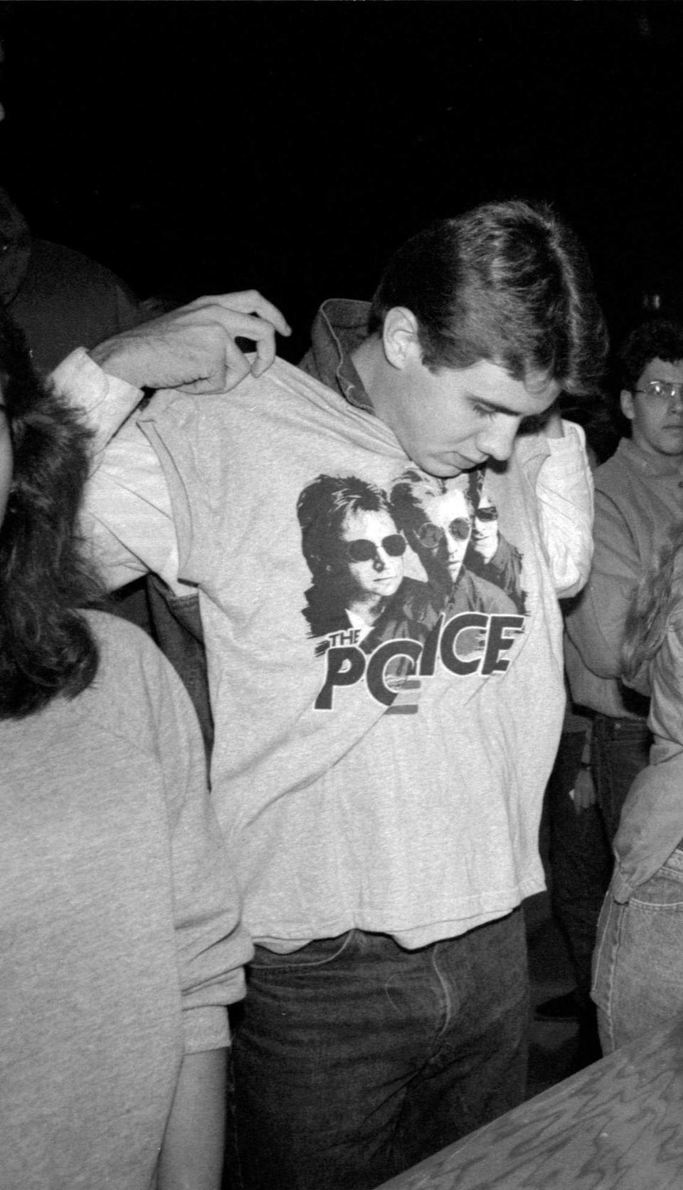 Jonathan Palmer was one of hundreds of people waiting in line to buy t-shirts during a Nov. 6, 1983 concert by The Police at Rupp Arena. The shirts sold for up to $14 to the more than 23,400 music lovers at the show by the English rock group lead by the singer Sting. The band was riding the wave of their most recent album, Synchronicity, which included a former No. 1 single, “Every Breath You Take.” Tickets were $12.50 and $13.50. The concert marked the fifth sold-out show in the seven-year history of the downtown arena. The others being concerts by Alabama, the Who and two shows by The Rolling Stones. Herald-Leader archive photo