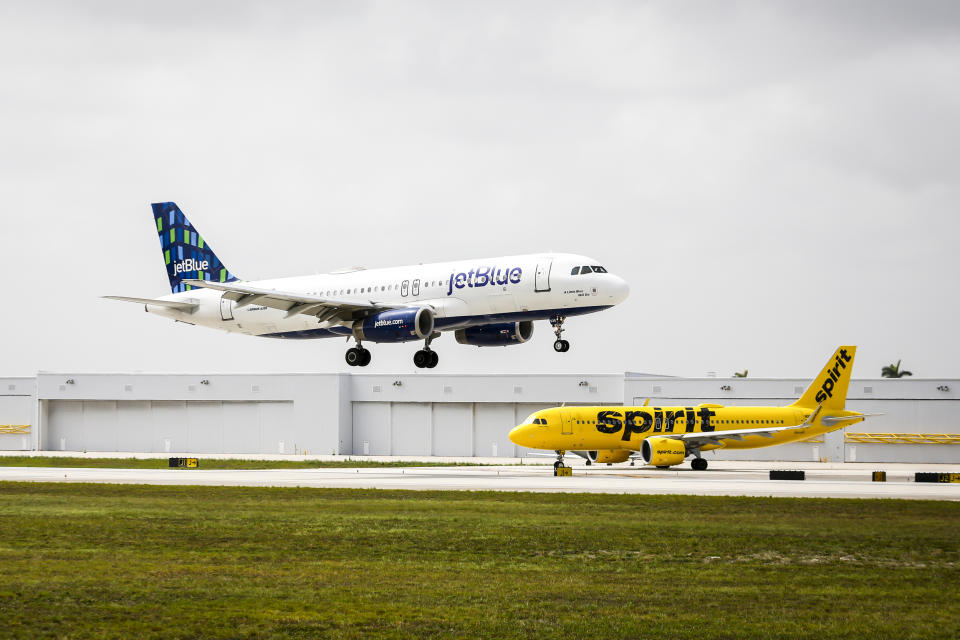 JetBlue and Spirit airplanes at Fort Lauderdale-Hollywood International Airport in Fort Lauderdale, Fla., on May 21, 2022. (Eva Marie Uzcategui / Bloomberg via Getty Images file)