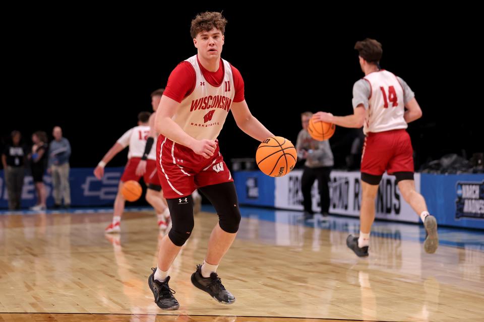 Mar 21, 2024; Brooklyn, NY, USA; Wisconsin Badgers guard Max Klesmit (11) brings the ball up court during team practice at Barclays Center. Mandatory Credit: Brad Penner-USA TODAY Sports